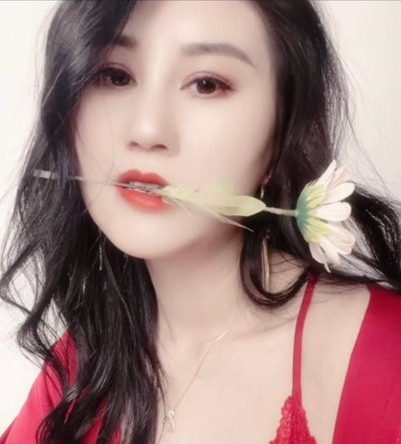 城西妩媚娘