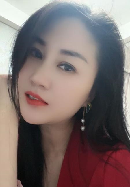 城西妩媚娘